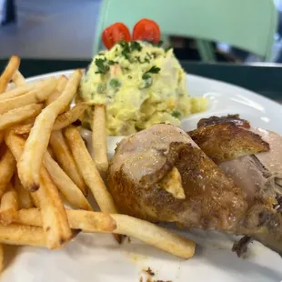 a plate of french fries and mashed potatoes