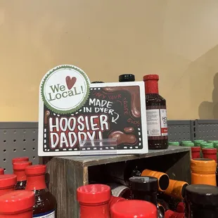 a sign that reads, we love local made in others's hoosier daddy