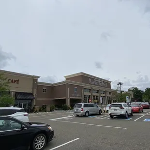a parking lot with cars parked in it