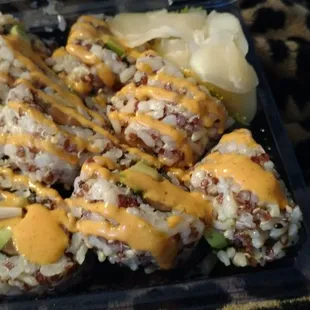 Spicy salmon and avocado sushi rolls