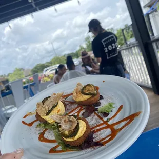 Deviled eggs &amp; black truffle hot sauce!