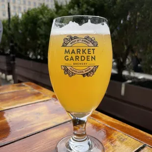 a glass of beer on a table