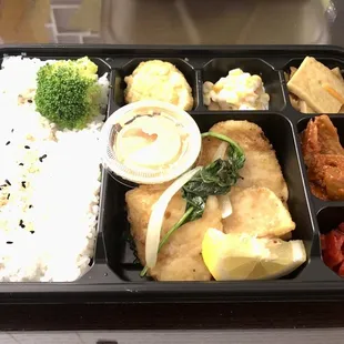 They have pre-made refrigerated items like this garlic butterfish bento box with banchan