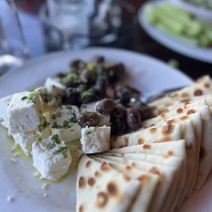 Olives and cheese appetizer.