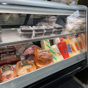 a deli case filled with food
