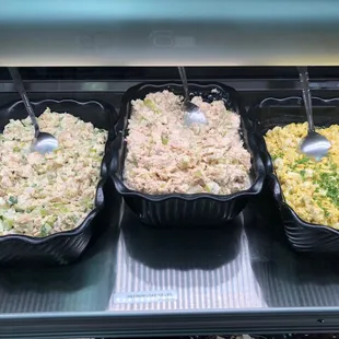 I think this is chicken salad, tuna salad, and egg salad. All fresh and available by the pound or in your sandwich!