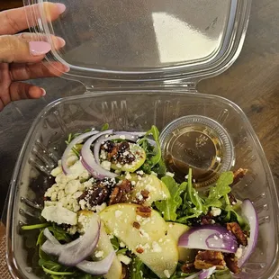 Arugula salad - with red onion, sliced apples, pecans, feta and delicious balsamic vinaigrette dressing