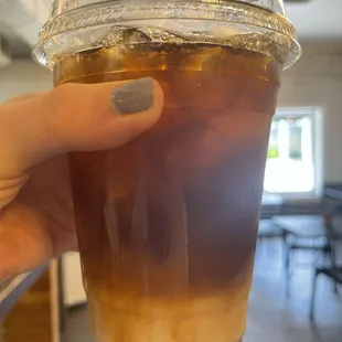 Lavender syrup in an iced coffee with oat milk