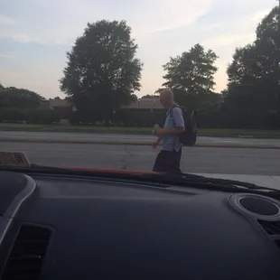 This guy just left Market Plus, brown bag in hand.  Livin' the dream.