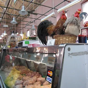 a variety of meats in a display case
