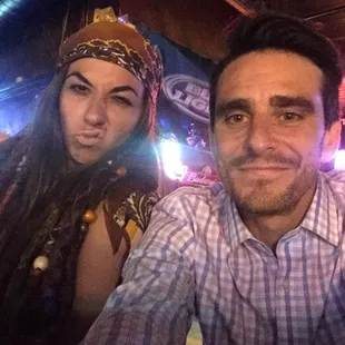 a man and a woman taking a selfie