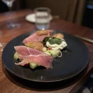Baratta and melon with prosciutto
