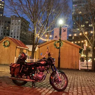 a motorcycle parked in front of a building