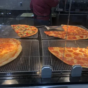 pizzas being prepared for sale