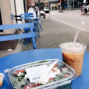Spinach salad with fruit, goat cheese, and almonds with a soy vanilla iced latte! Yummy!
