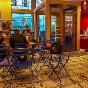 Indoor seating in the cafe section.
