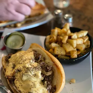 Philly Cheese Steak with cheese sauce and provolone
