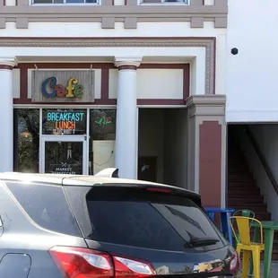 a car parked in front of the store