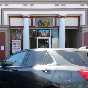 a car parked in front of the store