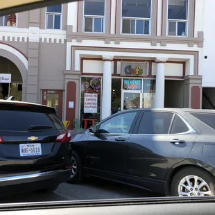 two cars in a parking lot