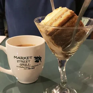 a cup of coffee and a dessert
