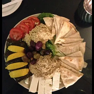 Hummus w Pita Bread, babaganouche, grape leaves &amp; feta cheese. Delicious !