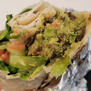 Falafel tasted good but was raw from inside and nor cooked properly. Wrap felt bit dry and needs more sauces.  Falafel Wrap