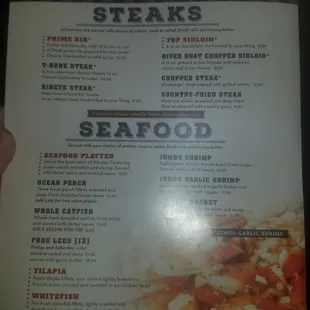 the menu for steaks and seafood