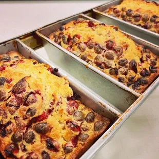 Cranberry orange bread fresh out of oven, awaiting glaze.