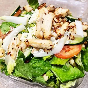 a salad in a plastic container