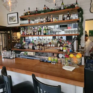 a bar with bottles of liquor on it