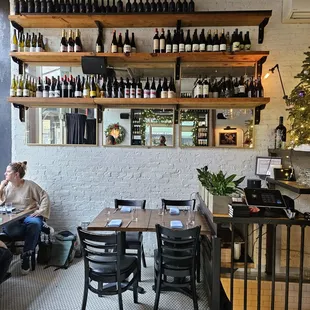 a man sitting at a table in a restaurant