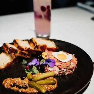 a plate of food and a drink