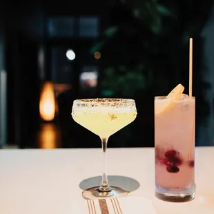 two cocktails on a table