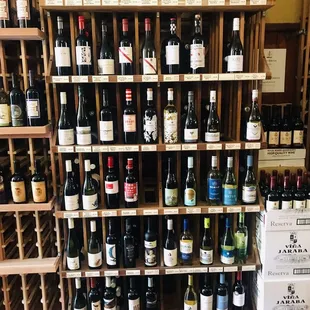 shelves of wine in a wine shop