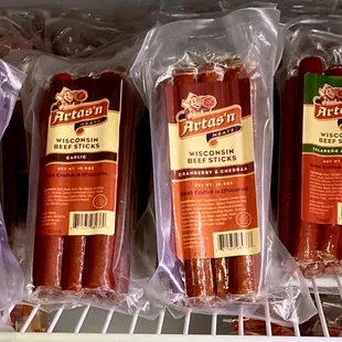 packaged sausages in a refrigerator