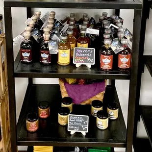 a shelf of food and condiments