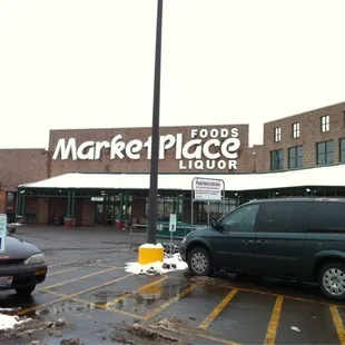 a car parked in front of the store