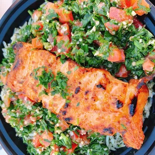 salmon and vegetables in a bowl