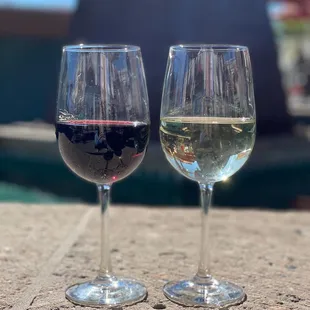 two glasses of white and red wine