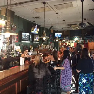 people sitting at the bar