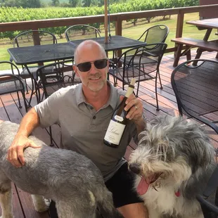 Tom with Gunnar &amp; Sassy enjoying a winery visit!