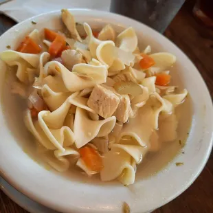 a bowl of chicken noodle soup