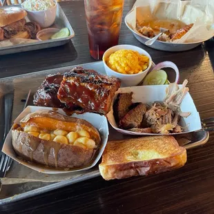 Mac and Cheese pulled #1 Pork, Brisket, Honey Wings and Baby Back Ribs Dinner Combo Sweet Corn Bread Baked Sweet Potato