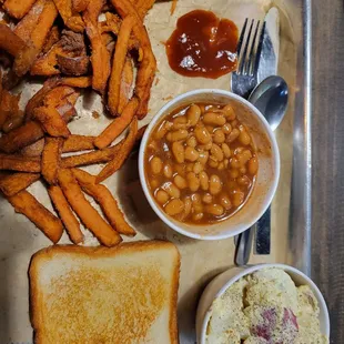 Potato salad, baked beans, and sweet potato fries. I didn't eat the toast this time.