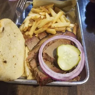 Brisket sandwich and fries
