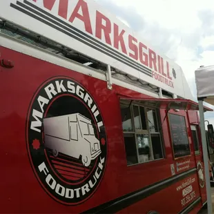 the logo on the side of the truck