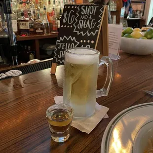 a mug of beer and a shot of whiskey