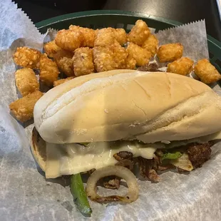 a sandwich and tater tots