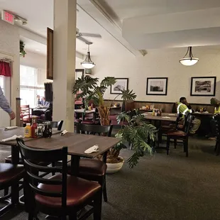 a man standing in a restaurant
